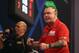 LONDON, ENGLAND - DECEMBER 16: Peter Wright of Great Britain reacts to winning his game against Jerry Hendriks of The Netherlands on day two of the 2017 William Hill PDC World Darts Championships at Alexandra Palace on December 16, 2016 in London, Englan