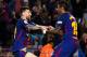 BARCELONA, SPAIN - SEPTEMBER 19: Lionel Messi of FC Barcelona celebrates with his team mate Paulinho after scoring his team's fifth goal during the La Liga match between Barcelona and SD Eibar at Camp Nou on September 19, 2017 in Barcelona, Spain. (Phot