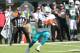 EAST RUTHERFORD, NJ - SEPTEMBER 24: Wide Receiver DeVante Parker #11 of the Miami Dolphins has a long gain against the New York Jets on September 24, 2017 at MetLife Stadium in East Rutherford, New Jersey. The Jets defeated the Dolphins 20-6. (Photo by Al