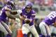 MINNEAPOLIS, MN - OCTOBER 1: Case Keenum #7 of the Minnesota Vikings hands the ball off to Latavius Murray #25 in the second half of the game against the Detroit Lions on October 1, 2017 at U.S. Bank Stadium in Minneapolis, Minnesota. (Photo by Adam Bettc