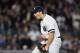 NEW YORK, NY - OCTOBER 03: Tommy Kahnle #48 of the New York Yankees celebrates the final out of the top of the seventh inning against the Minnesota Twins in the American League Wild Card Game at Yankee Stadium on October 3, 2017 in the Bronx borough of N