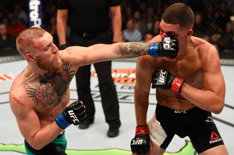 McGregor lands a left on Diaz during their second fight.