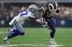 ARLINGTON, TX - OCTOBER 01: Jourdan Lewis #27 of the Dallas Cowboys pursues Todd Gurley #30 of the Los Angeles Rams in the first half of a game at AT&T Stadium on October 1, 2017 in Arlington, Texas. (Photo by Ronald Martinez/Getty Images)