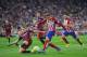 MADRID, SPAIN - SEPTEMBER 12: Fernando Torres of Club Atletico de Madrid has his shot blocked by Thomas Vermaelen of FC Barcelona during the La Liga match between Club Atletico de Madrid and FC Barcelona at Vicente Calderon Stadium on September 12, 2015