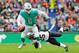 LONDON, ENGLAND - OCTOBER 01: (Re-transmission of image #856247554) Jay Cutler #6 of the Miami Dolphins is tackled by Rafael Bush #25 of the New Orleans Saints in the first half during the NFL game between the Miami Dolphins and the New Orleans Saints at