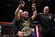 Dana White puts the belt on Demetrious Johnson...again.