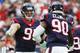 HOUSTON, TX - SEPTEMBER 18: J.J. Watt #99 and Jadeveon Clowney #90 of the Houston Texans celebrate a play in the first quarter of their game against the Kansas City Chiefs at NRG Stadium on September 18, 2016 in Houston, Texas. (Photo by Scott Halleran