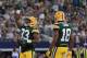 ARLINGTON, TX - OCTOBER 08: Aaron Jones #33 celebrates a touchdown with Randall Cobb #18 of the Green Bay Packers in the second quarter against the Dallas Cowboys at AT&T Stadium on October 8, 2017 in Arlington, Texas. (Photo by Ronald Martinez/Getty Im