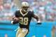 CHARLOTTE, NC - SEPTEMBER 24: Adrian Peterson #28 of the New Orleans Saints runs against the Carolina Panthers during their game at Bank of America Stadium on September 24, 2017 in Charlotte, North Carolina. (Photo by Grant Halverson/Getty Images)