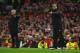 MANCHESTER, ENGLAND - JANUARY 15: Jurgen Klopp manager of Liverpool and Jose Mourinho manager of Manchester United give instructions during the Premier League match between Manchester United and Liverpool at Old Trafford on January 15, 2017 in Manchester