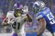 DETROIT, MI - NOVEMBER 24: Jerick McKinnon #21 of the Minnesota Vikings runs for a short gain as Tahir Whitehead #59 of the Detroit Lions defends during the fourth quarter of the annual Thanksgiving day game against the Detroit Lions at Ford Field on Nove