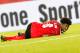 Austria's defender David Alaba lies injured on the pitch during the Group D FIFA World Cup 2018 qualification match between Austria and Georgia at the Ernst Happel Stadium in Vienna on September 5, 2017. / AFP PHOTO / APA / GEORG HOCHMUTH / Austria OUT
