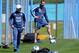 Argentina's team coach Jorge Sampaoli (L) watches his players during a training session in Ezeiza, Buenos Aires on October 7, 2017 ahead of a 2018 FIFA World Cup South American qualifier football match against Ecuador to be held in Quito on October 10. /