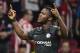 Chelsea's Belgian striker Michy Batshuayi celebrates after scoring during the UEFA Champions League Group C football match Club Atletico de Madrid vs Chelsea FC at the Metropolitan stadium in Madrid on September 27, 2017. / AFP PHOTO / PIERRE-PHILIPPE MA