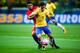 SAO PAULO, BRAZIL - OCTOBER 10: Gonzalo Jara (L) of Chile and Philippe Coutinho of Brazil in action during the match between Brazil and Chile for the 2018 FIFA World Cup Russia Qualifier at Allianz Parque Stadium on October 10, 2017 in Sao Paulo, Brazil.