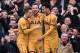 Tottenham Hotspur's English striker Harry Kane (C) celebrates after scoring a hat-trick with Tottenham Hotspur's Danish midfielder Christian Eriksen (L) and Tottenham Hotspur's English midfielder Dele Alli during the English FA Cup fifth round football ma