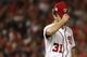 WASHINGTON, DC - OCTOBER 12: Max Scherzer #31 of the Washington Nationals reacts after giving up a two run double to Addison Russell #27 of the Chicago Cubs during the fifth inning in game five of the National League Division Series at Nationals Park on O