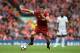 Liverpool's German midfielder Emre Can runs with the ball during the English Premier League football match between Liverpool and Manchester United at Anfield in Liverpool, north west England on October 14, 2017. / AFP PHOTO / Paul ELLIS / RESTRICTED TO ED