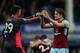 LIVERPOOL, ENGLAND - OCTOBER 01: Nick Pope of Burnley and James Tarkowski of Burnley celebrate victory together after the Premier League match between Everton and Burnley at Goodison Park on October 1, 2017 in Liverpool, England. (Photo by Alex Livesey/G