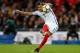 England's defender Kyle Walker takes a shot from a free kick during the FIFA World Cup 2018 qualification football match between England and Slovenia at Wembley Stadium in London on October 5, 2017. / AFP PHOTO / Ian KINGTON / NOT FOR MARKETING OR ADVERT