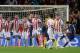 Barcelona's Argentinian forward Lionel Messi (R) shoots a free kick to score a goal during the UEFA Champions League Group D football match between FC Barcelona vs Olympiacos FC on October 18, 2017 at the Camp Nou stadium in Barcelona. / AFP PHOTO / Josep