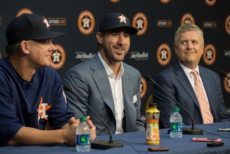 As the trade talks went on, Luhnow (right, with manager A.J. Hinch and Verlander) realized how much he wanted it to get done.