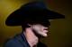 Donald Cerrone is the man in the black hat.