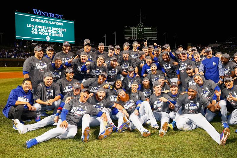 CHICAGO, IL - OCTOBER 19:  The Los Angeles Dodgers pose after defeating the Chicago Cubs 11-1 in game five of the National League Championship Series at Wrigley Field on October 19, 2017 in Chicago, Illinois. The Dodgers advance to the 2017 World Series. 