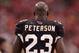 GLENDALE, AZ - OCTOBER 15: Running back Adrian Peterson #23 of the Arizona Cardinals on the sidelines during the NFL game against the Tampa Bay Buccaneers at the University of Phoenix Stadium on October 15, 2017 in Glendale, Arizona. The Cardinals defea