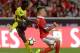 Benfica's Spanish defender Alex Grimaldo (R) vies with Pacos Ferreira's Australian forward Awer Mabil during the Portuguese league football match SL Benfica vs FC Pacos de Ferreira at the Luz stadium in Lisbon on September 23, 2017. / AFP PHOTO / JOSE MAN