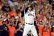 HOUSTON, TX - OCTOBER 21: Carlos Correa #1 of the Houston Astros reacts after Yuli Gurriel #10 hit a single against Tommy Kahnle #48 of the New York Yankees during the fifth inning in Game Seven of the American League Championship Series at Minute Maid P