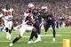 FOXBORO, MA - OCTOBER 22: Brandin Cooks #14 of the New England Patriots carries the ball for a touchdown as Rob Gronkowski #87 throws a block during the second quarter of a game against the Atlanta Falcons at Gillette Stadium on October 22, 2017 in Foxbo