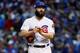 CHICAGO, IL - OCTOBER 11: Jake Arrieta #49 of the Chicago Cubs reacts in the third inning during game four of the National League Division Series against the Washington Nationals at Wrigley Field on October 11, 2017 in Chicago, Illinois. (Photo by Jonath