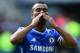 Chelsea's English defender Ashley Cole gestures to Chelsea fans following the English Premier League football match between Cardiff City and Chelsea at the Cardiff City Stadium in Cardiff on May 11, 2014. Chelsea won 2-1. AFP PHOTO/BEN STANSALL - RESTRIC