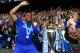 LONDON, ENGLAND - MAY 24: Didier Drogba of Chelsea celebrates with fans and the trophy after the Barclays Premier League match between Chelsea and Sunderland at Stamford Bridge on May 24, 2015 in London, England. Chelsea were crowned Premier League cham
