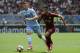 ROME, ROMA - APRIL 30: Sergej Milinkovic Savic of SS Lazio compete for the ball with Emerson Palmieri of AS Roma during the Serie A match between AS Roma and SS Lazio at Stadio Olimpico on April 30, 2017 in Rome, Italy. (Photo by Marco Rosi/Getty Images