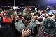 COLUMBUS, OH - OCTOBER 28: J.T. Barrett #16 of the Ohio State Buckeyes is surrounded by fans as he walks off the field after defeating Penn State 39-38 at Ohio Stadium on October 28, 2017 in Columbus, Ohio. (Photo by Jamie Sabau/Getty Images)