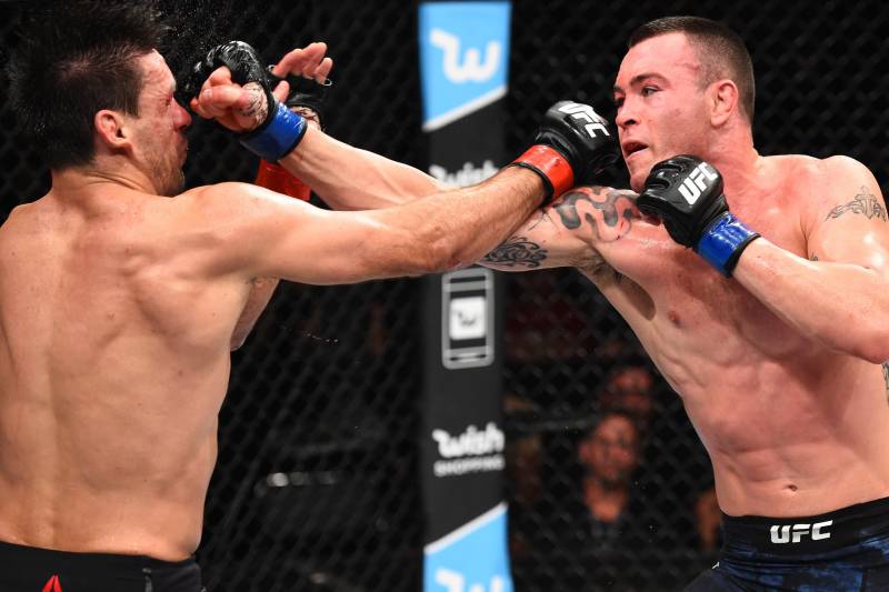 SAO PAULO, BRAZIL - OCTOBER 28: (R-L) Colby Covington punches Demian Maia of Brazil in their welterweight bout during the UFC Fight Night event inside the Ibirapuera Gymnasium on October 28, 2017 in Sao Paulo, Brazil. (Photo by Josh Hedges/Zuffa LLC/Zuff