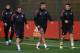 Manchester United's Armenian midfielder Henrikh Mkhitaryan (L), Manchester United's Spanish midfielder Juan Mata (2L), Manchester United's Argentinian defender Marcos Rojo and Manchester United's Spanish midfielder Ander Herrera attends a team training s
