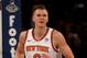 NEW YORK, NY - OCTOBER 27: Kristaps Porzingis #6 of the New York Knicks celebrates his dunk in the second half against the Brooklyn Nets at Madison Square Garden on October 27, 2017 in New York City. NOTE TO USER: User expressly acknowledges and agrees t