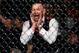 McGregor cheers on Lobov from cageside during UFC Fight Night 118.