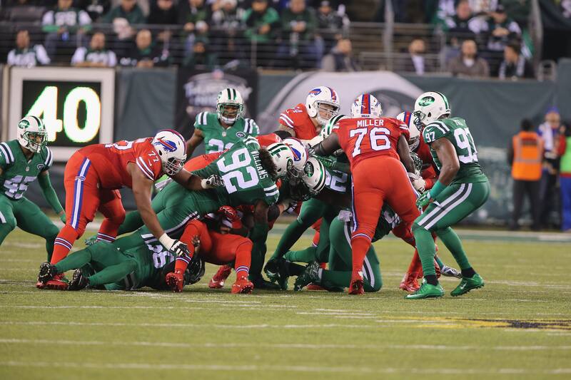 EAST RUTHERFORD, NJ - NOVEMBER 12: Defensive End Leonard Williams #92 of the New York Jets makes a stop against the Buffalo Bills at MetLife Stadium on November 12, 2015 in East Rutherford, New Jersey. Both teams wore their Thursday Night Football Color