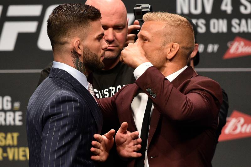 LAS VEGAS, NV - OCTOBER 06: (L-R) Opponents Cody Garbrandt and TJ Dillasshaw face off during the UFC 217 news conference inside T-Mobile Arena on October 6, 2017 in Las Vegas, Nevada. (Photo by Jeff Bottari/Zuffa LLC/Zuffa LLC via Getty Images)