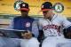 Alex Cora (left) and Alex Bregman