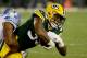 "You are forced to be mentally tough at that point," running back Aaron Jones says. "As a little kid, having your parents taken from you? That's tough."