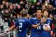 Japan's defender Makino Tomoaki (C) celebrates with teammates after scoring a goal during the friendly football match between Japan and Brazil on November 10, 2017 at the Pierre Mauroy Stadium in Villeneuve d'Ascq, northern France. / AFP PHOTO / PHILIPPE