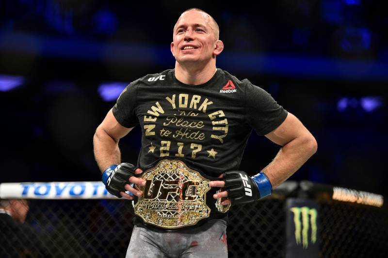 NEW YORK, NY - NOVEMBER 04: Georges St-Pierre of Canada celebrates after defeating Michael Bisping of England in their UFC middleweight championship bout during the UFC 217 event inside Madison Square Garden on November 4, 2017 in New York City. (Photo b