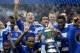 Chelsea players celebrate with the trophy after Chelsea's 2-1 win in the FA Cup final football match between Liverpool and Chelsea at Wembley Stadium in London, England on May 5, 2012. AFP PHOTO/IAN KINGTON