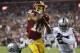 LANDOVER, MD - SEPTEMBER 24: Wide receiver Josh Doctson #18 of the Washington Redskins makes a catch over cornerback David Amerson #29 of the Oakland Raiders and free safety Reggie Nelson #27 of the Oakland Raiders in the third quarter at FedExField on Se