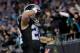 CHARLOTTE, NC - NOVEMBER 13: Christian McCaffrey #22 of the Carolina Panthers salutes the crowd after a touchdown against the Miami Dolphins in the second quarter during their game at Bank of America Stadium on November 13, 2017 in Charlotte, North Carol